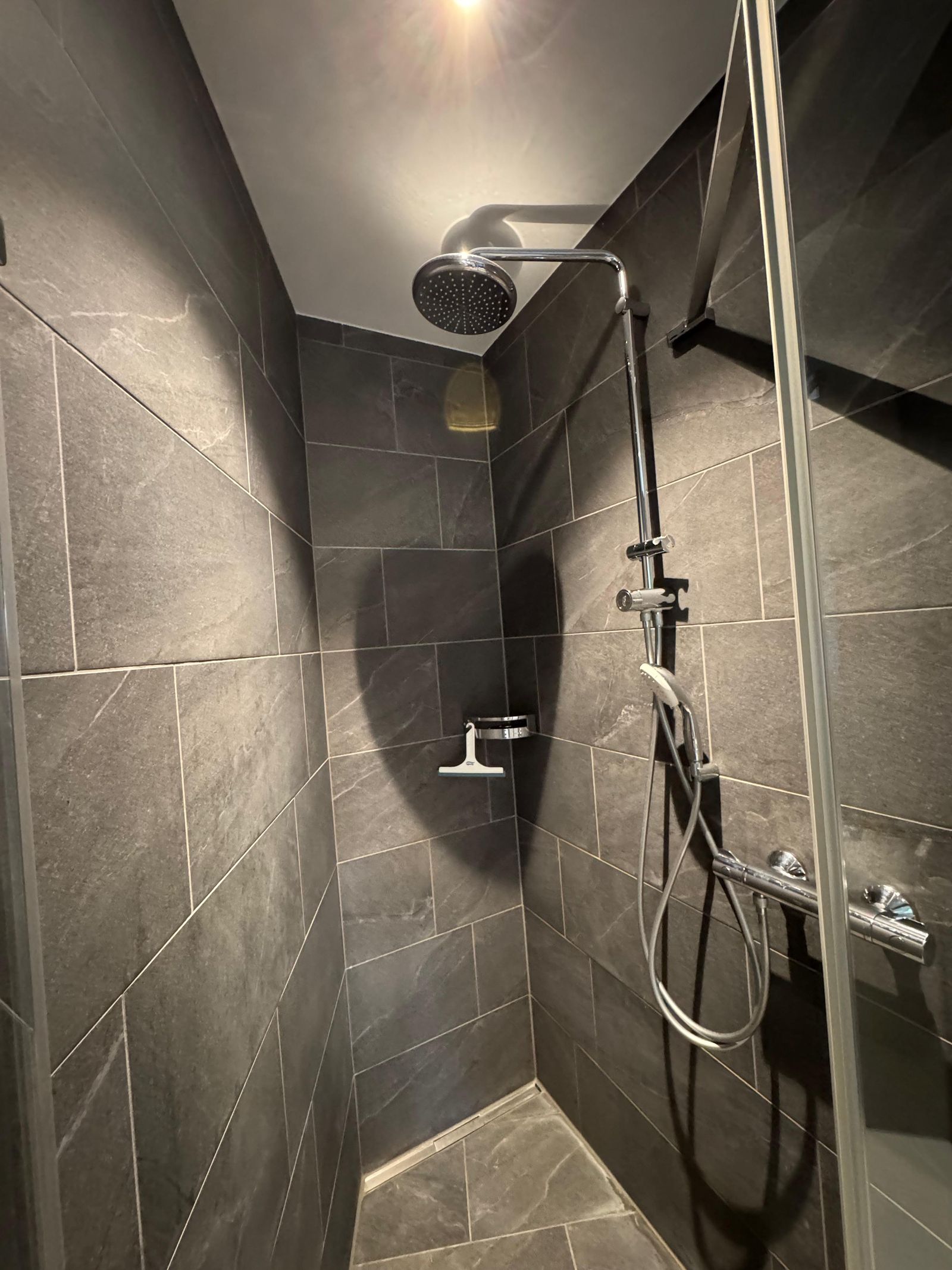 Bathroom at Villa 77 with a walk-in shower and shower WC