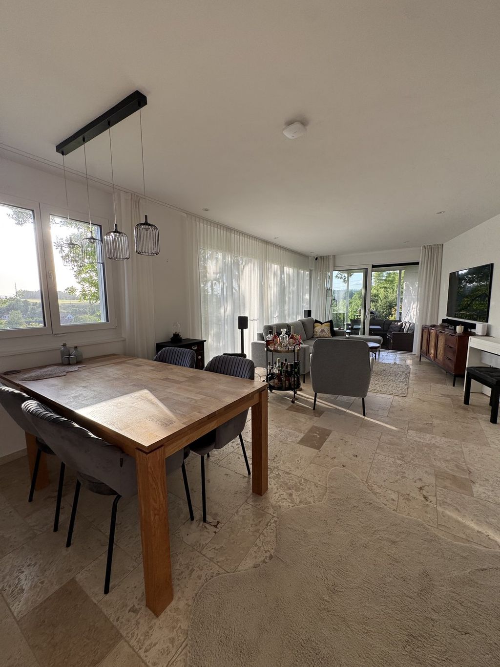 Open-plan living and dining space at Villa 77