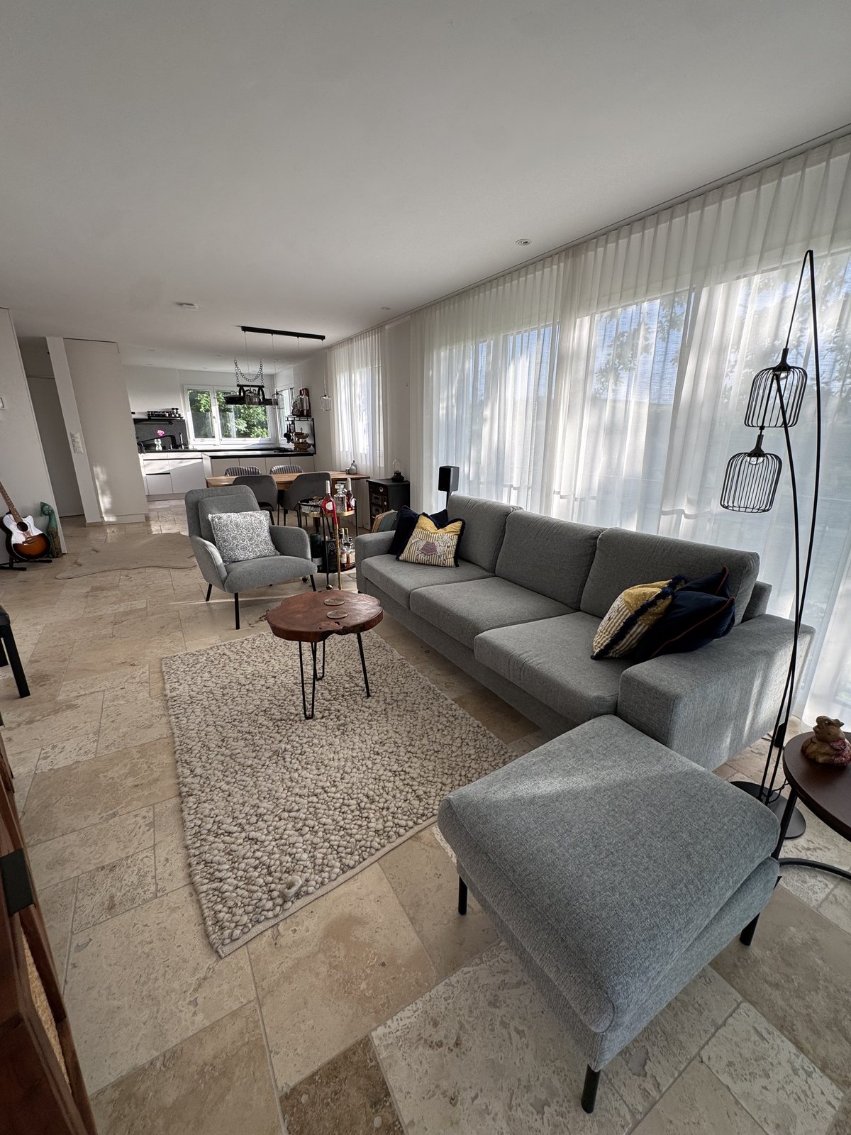 Furnished living room with designer sofa — Villa 77 corporate house near Baden