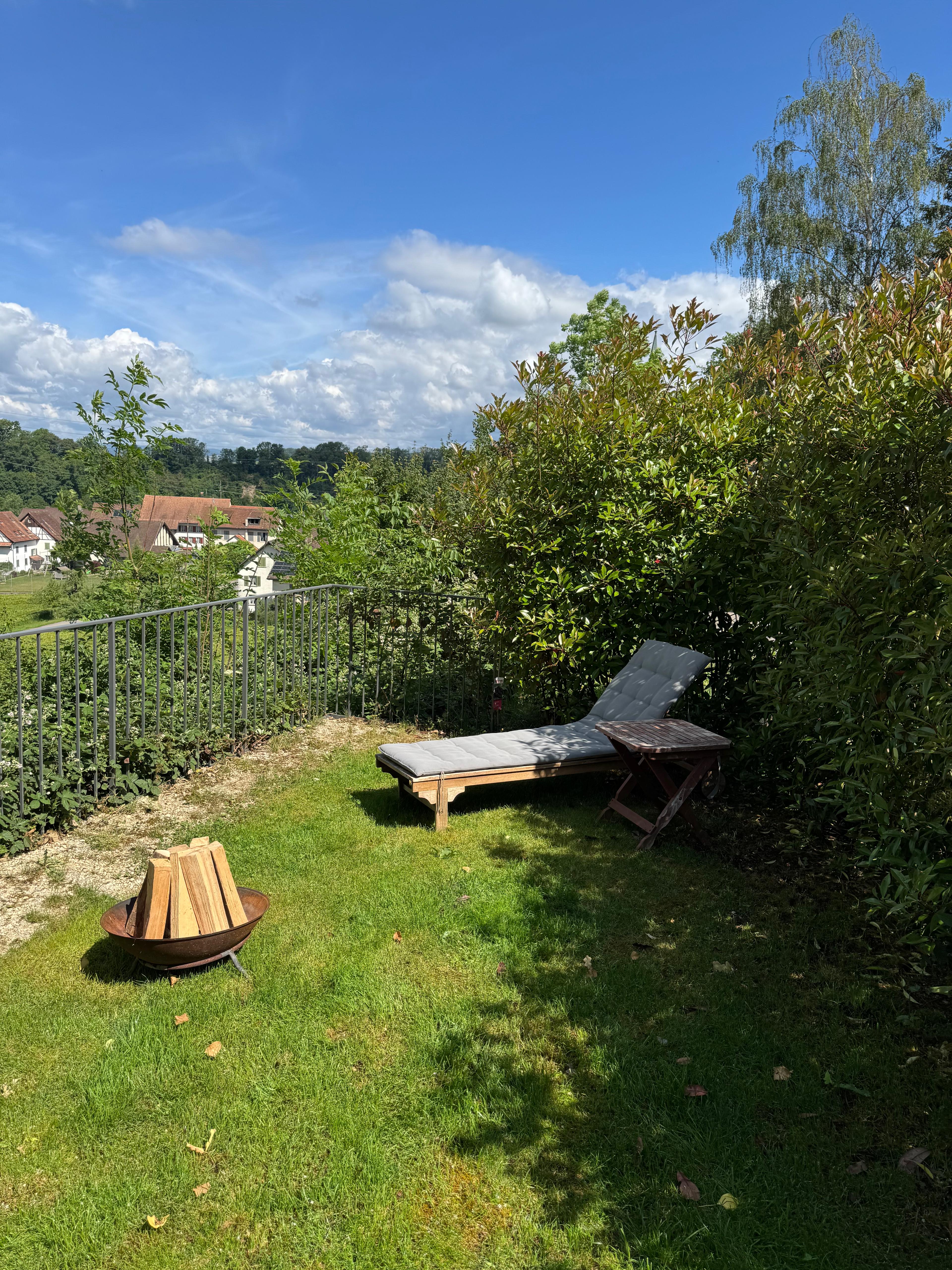 Private garden with sun lounger at Villa 77, Unterendingen, Aargau